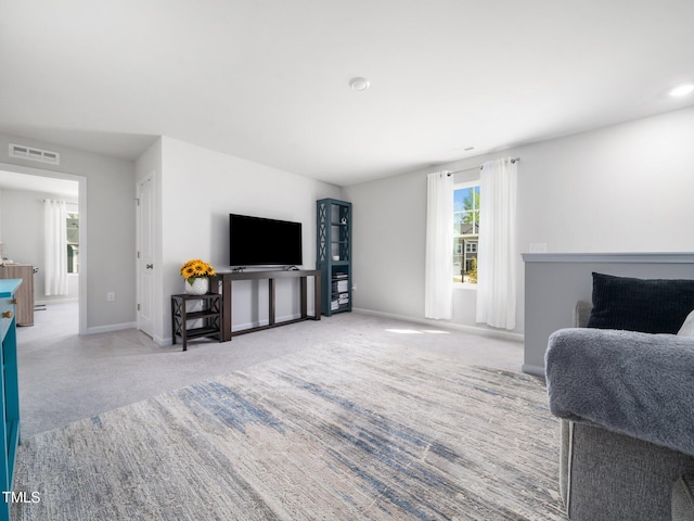 1650 Singing Bird Trl, Wake Forest, NC 27587 - living room with carpet flooring and baseboards