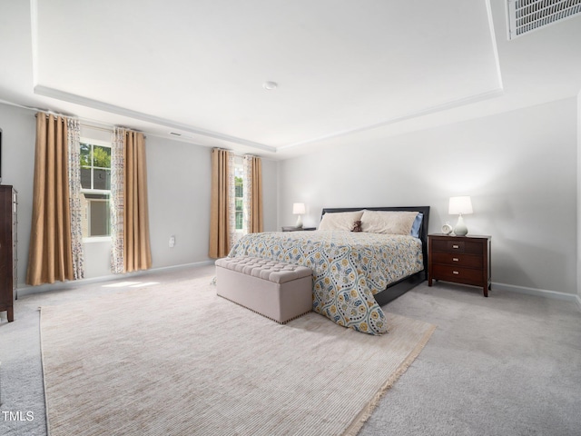 1650 Singing Bird Trl, Wake Forest, NC 27587 - bedroom featuring light carpet and a raised ceiling
