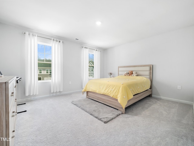 1650 Singing Bird Trl, Wake Forest, NC 27587 - bedroom with baseboards and light colored carpet