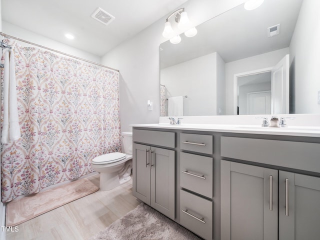1650 Singing Bird Trl, Wake Forest, NC 27587 - bathroom with double vanity and a shower with curtain