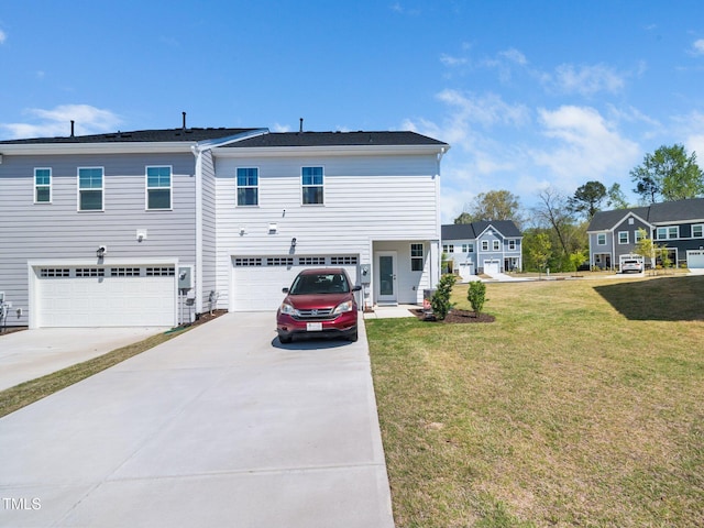 1650 Singing Bird Trl, Wake Forest, NC 27587 - rear view of property featuring concrete driveway, a lawn, and a garage