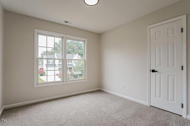 413 Hanska Way, Raleigh, NC 27610 - spare room with carpet