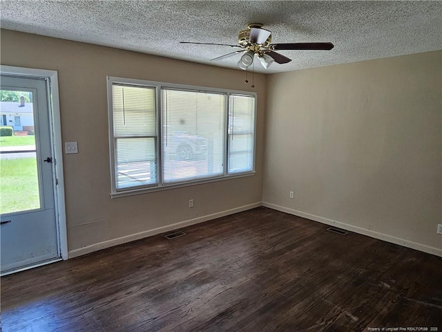 1918 Roxie Ave, Fayetteville, NC 28304 - spare room featuring dark wood-style floors, a textured ceiling, and ceiling fan