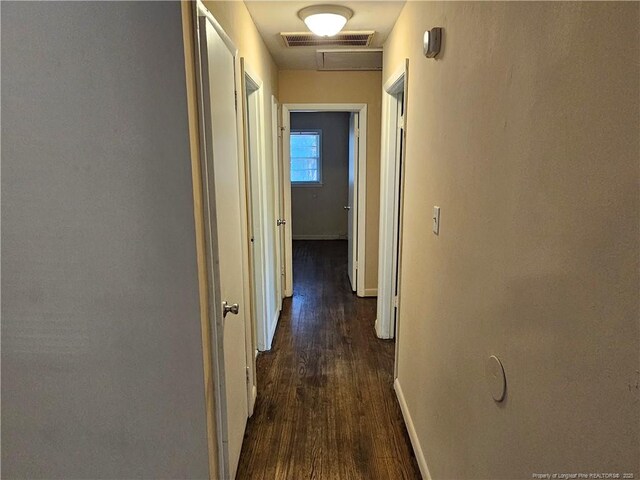 1918 Roxie Ave, Fayetteville, NC 28304 - hall featuring dark wood-type flooring and attic access