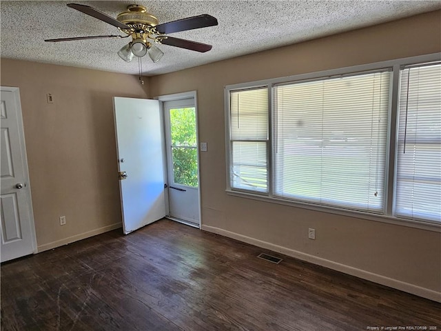 1918 Roxie Ave, Fayetteville, NC 28304 - empty room with ceiling fan, dark wood-style floors, and a textured ceiling