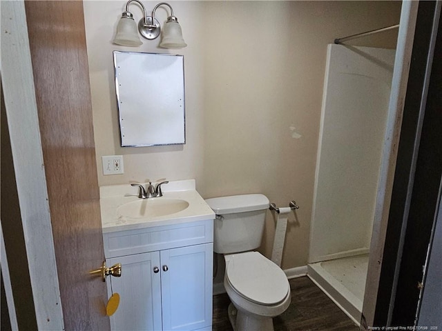 1918 Roxie Ave, Fayetteville, NC 28304 - full bath with a shower stall, vanity, and wood finished floors