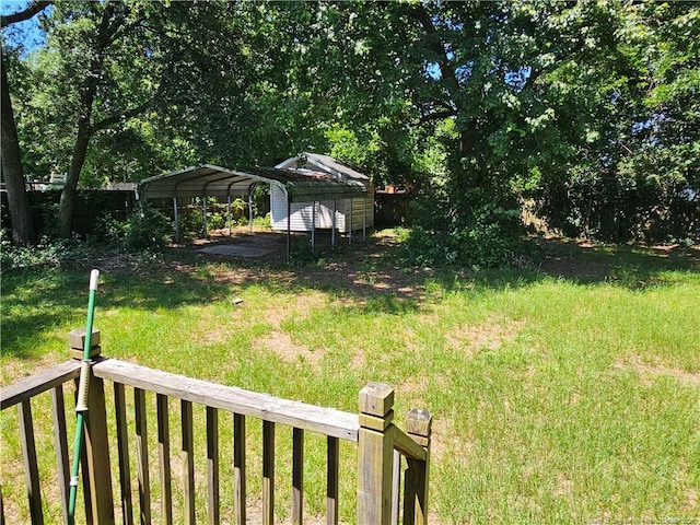 1918 Roxie Ave, Fayetteville, NC 28304 - view of green lawn featuring a carport