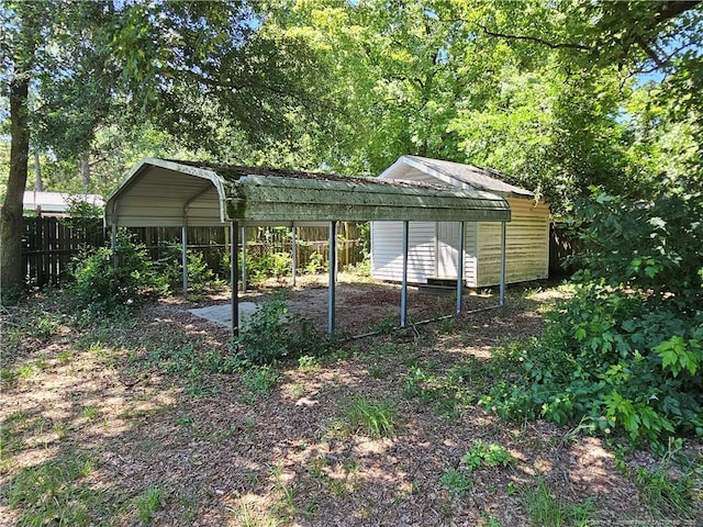 1918 Roxie Ave, Fayetteville, NC 28304 - view of outdoor structure with a carport