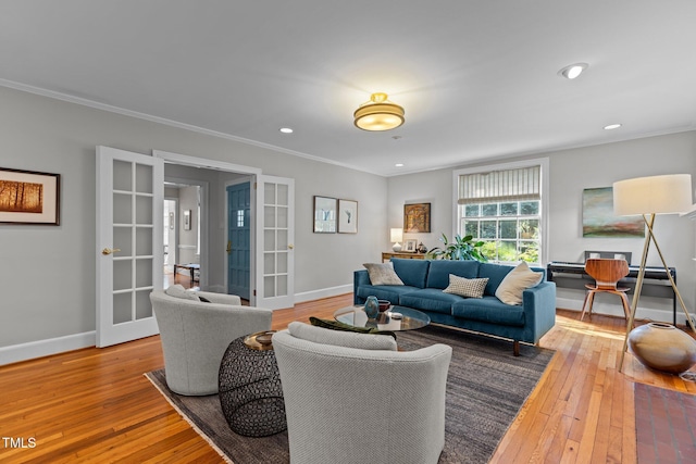 2706 Stuart Dr, Durham, NC 27707 - living room with french doors, hardwood / wood-style floors, crown molding, and recessed lighting