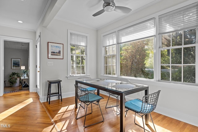 2706 Stuart Dr, Durham, NC 27707 - dining room featuring ceiling fan, light wood-type flooring, and crown molding