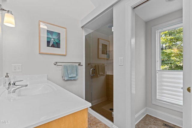 2706 Stuart Dr, Durham, NC 27707 - full bathroom with a stall shower, tile patterned floors, and vanity