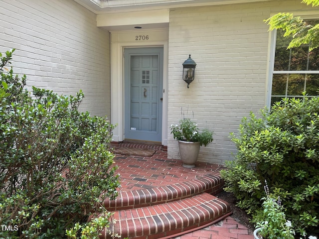 2706 Stuart Dr, Durham, NC 27707 - property entrance featuring brick siding