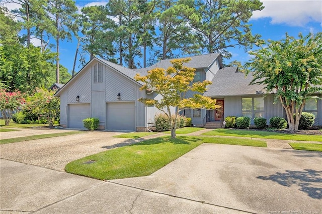 106 Woodrow St, Fayetteville, NC 28303 - mid-century inspired home with a front lawn, driveway, an attached garage, and a shingled roof