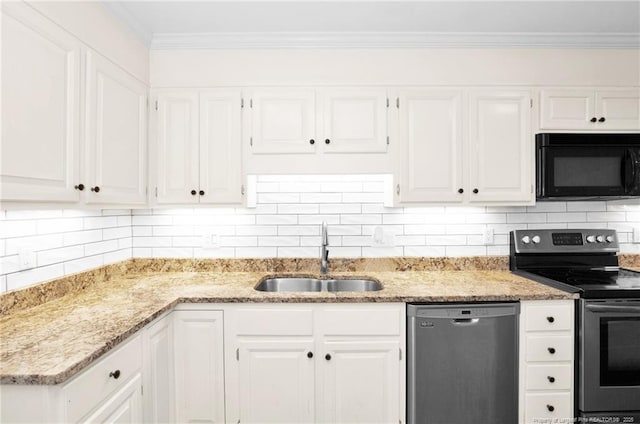 106 Woodrow St, Fayetteville, NC 28303 - kitchen with stainless steel appliances, white cabinetry, light stone countertops, ornamental molding, and tasteful backsplash