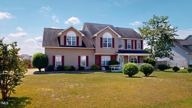 14 Gloucester Ct, Cameron, NC 28326 - view of front of house with a front yard and covered porch