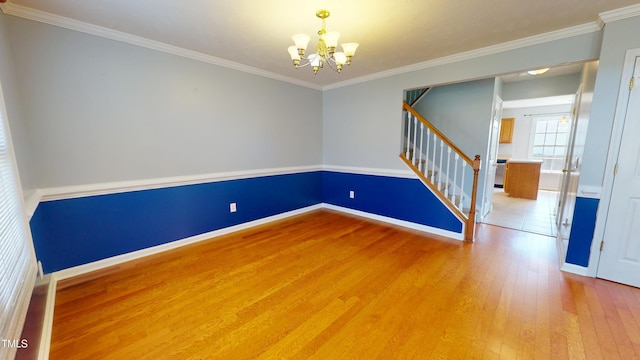 14 Gloucester Ct, Cameron, NC 28326 - unfurnished room with a chandelier, light wood-style flooring, stairway, and crown molding