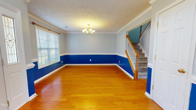 14 Gloucester Ct, Cameron, NC 28326 - entryway featuring a chandelier, stairway, light wood-style floors, and ornamental molding