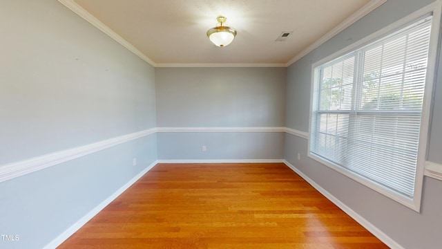 14 Gloucester Ct, Cameron, NC 28326 - spare room featuring light wood-style floors and ornamental molding
