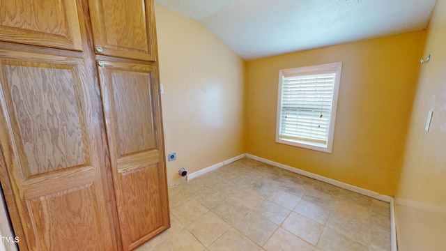 14 Gloucester Ct, Cameron, NC 28326 - laundry area featuring cabinet space, hookup for an electric dryer, and light tile patterned floors