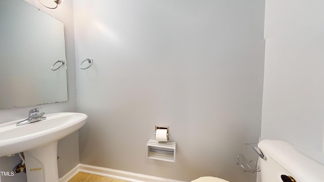 14 Gloucester Ct, Cameron, NC 28326 - half bath featuring toilet and wood finished floors