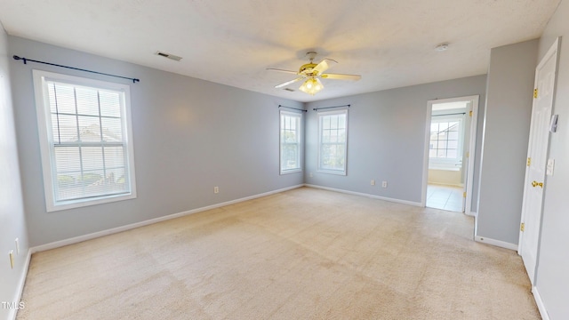 14 Gloucester Ct, Cameron, NC 28326 - carpeted spare room featuring plenty of natural light, a smoke detector, and a ceiling fan