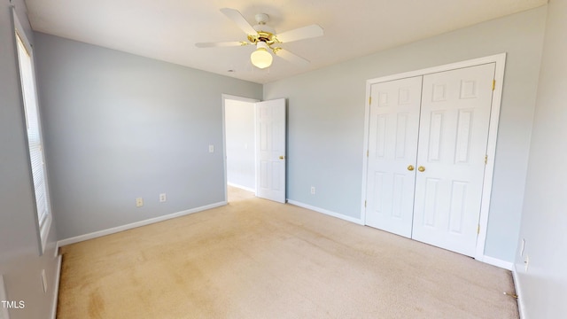 14 Gloucester Ct, Cameron, NC 28326 - unfurnished bedroom with carpet floors, a closet, and a ceiling fan