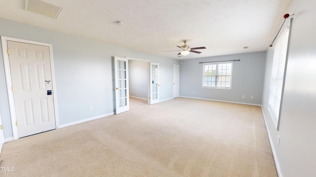 14 Gloucester Ct, Cameron, NC 28326 - unfurnished bedroom featuring french doors, carpet, and a ceiling fan