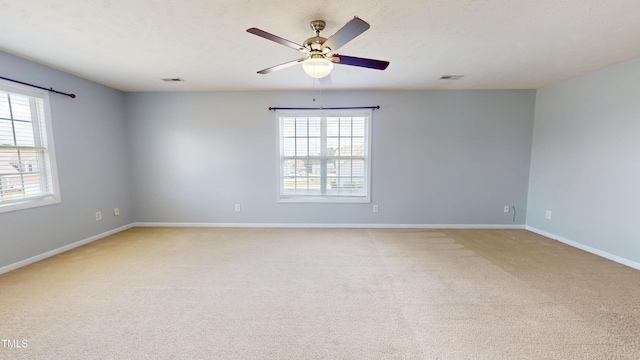 14 Gloucester Ct, Cameron, NC 28326 - spare room with healthy amount of natural light, light carpet, and a ceiling fan
