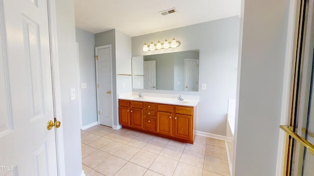 14 Gloucester Ct, Cameron, NC 28326 - bathroom with double vanity and tile patterned flooring