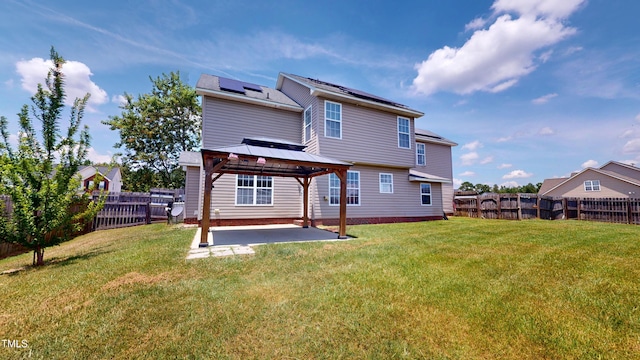 14 Gloucester Ct, Cameron, NC 28326 - rear view of house featuring a gazebo, solar panels, a patio, and a fenced backyard