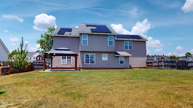 14 Gloucester Ct, Cameron, NC 28326 - back of property with a gazebo, roof mounted solar panels, and a fenced backyard