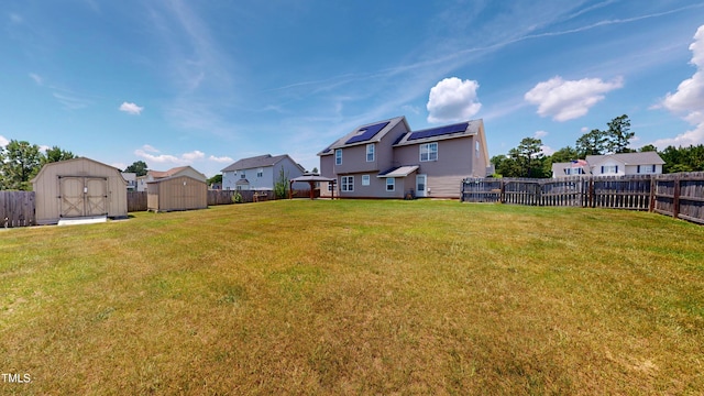 14 Gloucester Ct, Cameron, NC 28326 - fenced backyard featuring a storage unit and a residential view