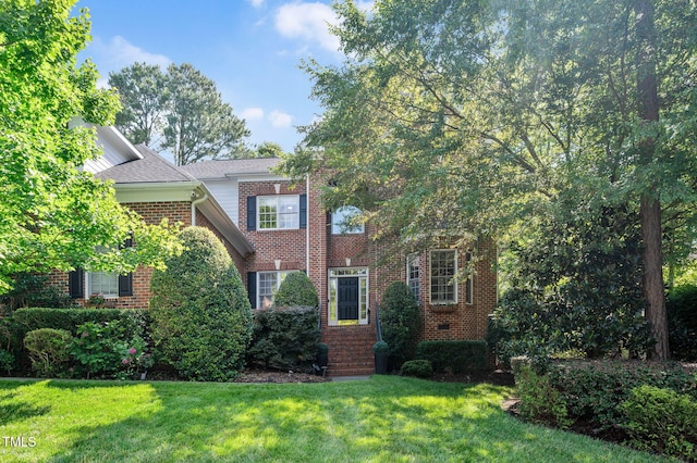 12452 Richmond Run Dr, Raleigh, NC 27614 - view of front of home featuring a front yard and brick siding