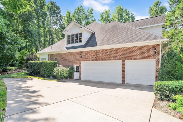 12452 Richmond Run Dr, Raleigh, NC 27614 - view of front of home featuring brick siding, concrete driveway, a garage, and a shingled roof