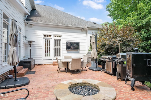 12452 Richmond Run Dr, Raleigh, NC 27614 - view of patio with a fire pit and outdoor dining area