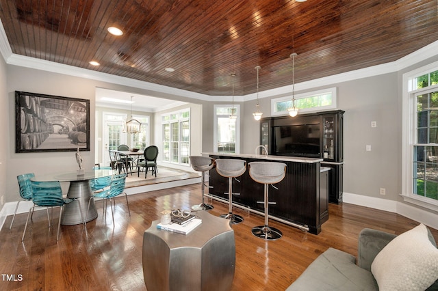 12452 Richmond Run Dr, Raleigh, NC 27614 - living room with wood ceiling, dark wood-style flooring, and crown molding