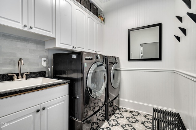 12452 Richmond Run Dr, Raleigh, NC 27614 - laundry area with washing machine and clothes dryer, cabinet space, and tile patterned flooring