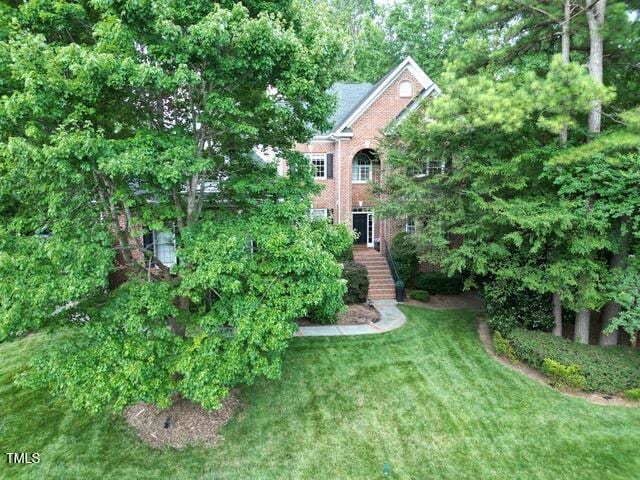 12452 Richmond Run Dr, Raleigh, NC 27614 - view of green lawn featuring stairway