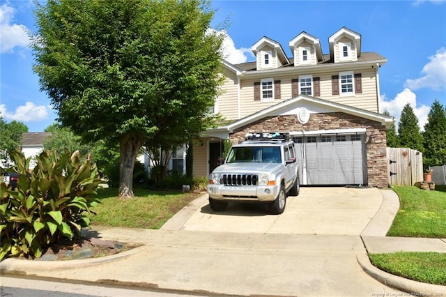 232 Cinder Cross Way, Garner, NC 27529 - view of front of property with driveway, a garage, and stone siding
