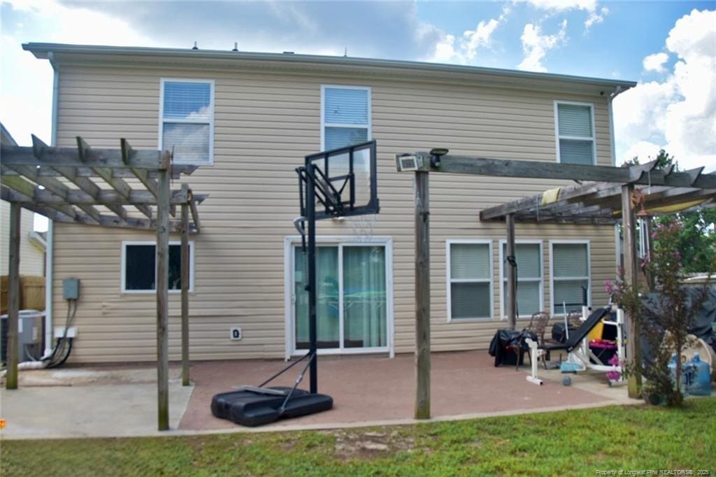 232 Cinder Cross Way, Garner, NC 27529 - back of property with a pergola and a patio area