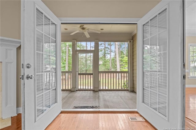 85 Shining Water Ln, Spring Lake, NC 28390 - unfurnished sunroom featuring wood-type flooring and ornamental molding