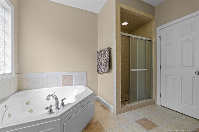 85 Shining Water Ln, Spring Lake, NC 28390 - bathroom featuring a shower stall, a whirlpool tub, and tile patterned floors