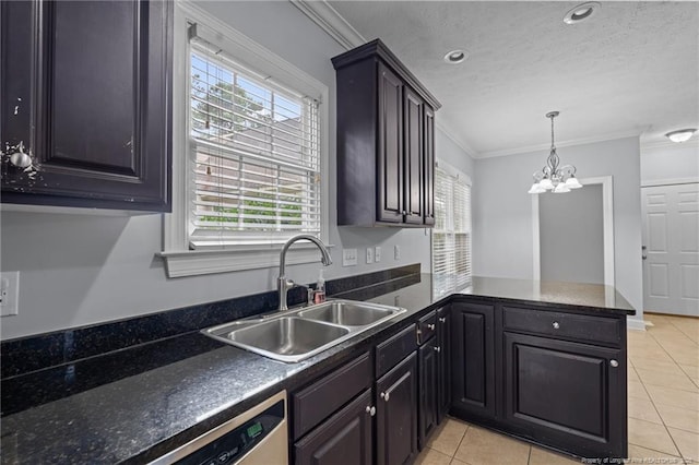 85 Shining Water Ln, Spring Lake, NC 28390 - kitchen featuring crown molding, light tile patterned flooring, plenty of natural light, a chandelier, and a peninsula