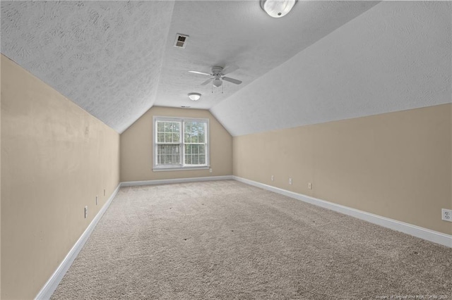 85 Shining Water Ln, Spring Lake, NC 28390 - additional living space with a textured ceiling, carpet floors, lofted ceiling, and ceiling fan