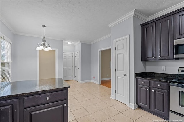 85 Shining Water Ln, Spring Lake, NC 28390 - kitchen with appliances with stainless steel finishes, a chandelier, light tile patterned flooring, hanging light fixtures, and dark stone counters