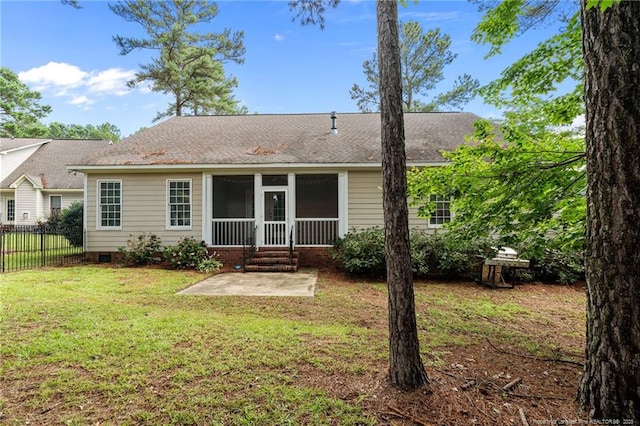 85 Shining Water Ln, Spring Lake, NC 28390 - back of property with a patio, a sunroom, and roof with shingles