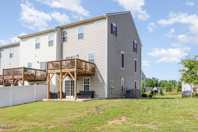 235 Misty Pike Dr, Raleigh, NC 27603 - back of house featuring a wooden deck and a patio area