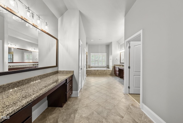 7112 Hasentree Way, Wake Forest, NC 27587 - full bath featuring a bath, vanity, healthy amount of natural light, and tile patterned floors