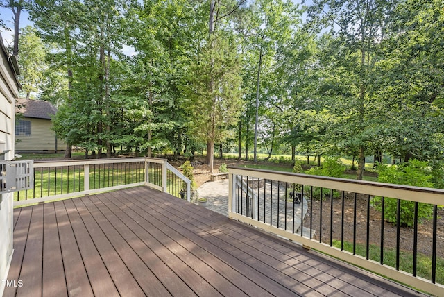 7112 Hasentree Way, Wake Forest, NC 27587 - wooden deck with a lawn and view of scattered trees