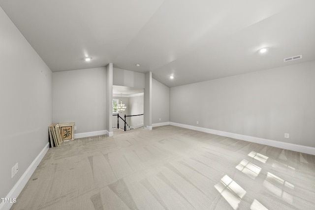 7112 Hasentree Way, Wake Forest, NC 27587 - additional living space with light colored carpet and vaulted ceiling